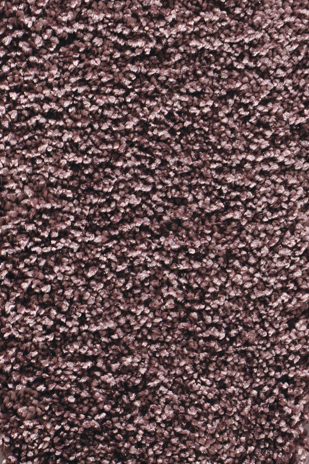 Close-up of a brown textured carpet